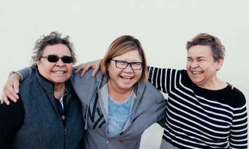 three-mature-women-laugh-in-friendship