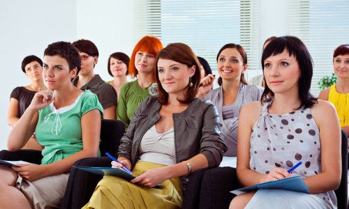 Group of women listening to a presentation
